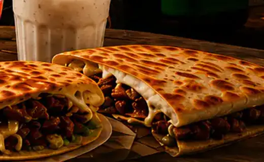 Golden quesadilla with melted cheese